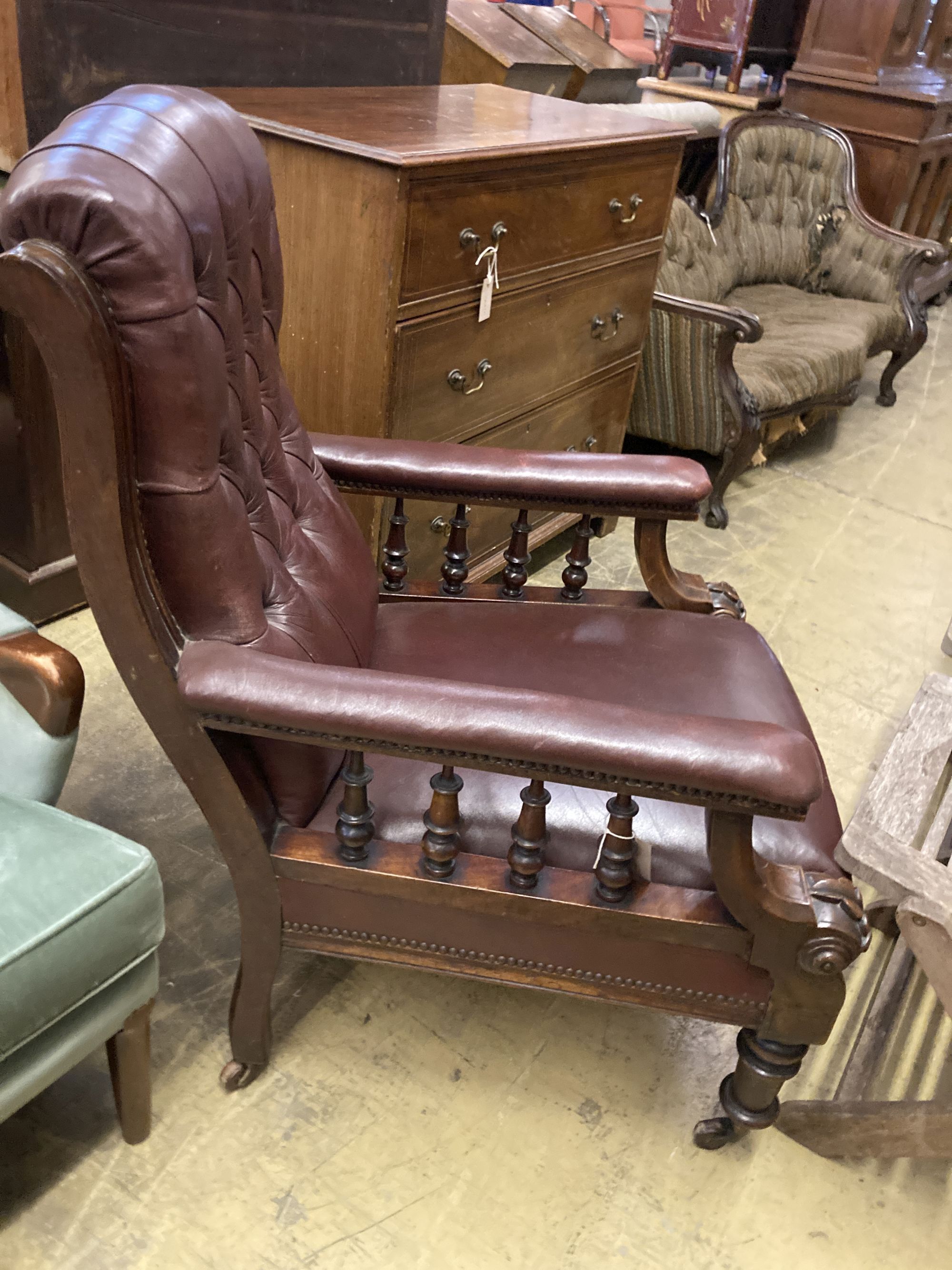 An early Victorian burgundy leather library chair, width 68cm, depth 80cm, height 98cm